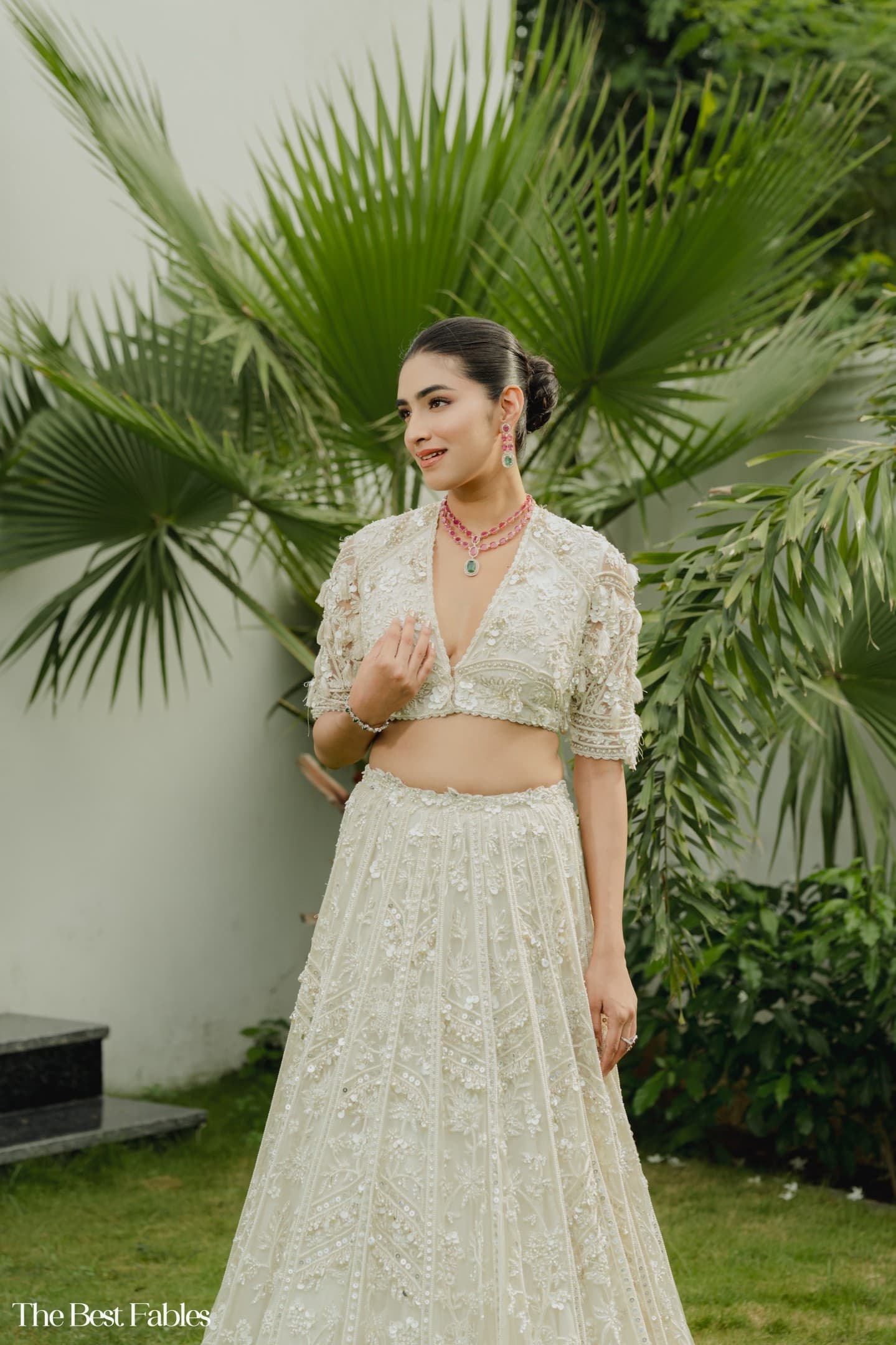 Ivory embroidered lehenga styled outdoors